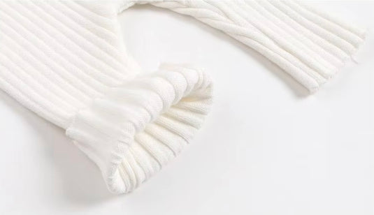 Baby girl's white knitted cotton long-sleeved romper