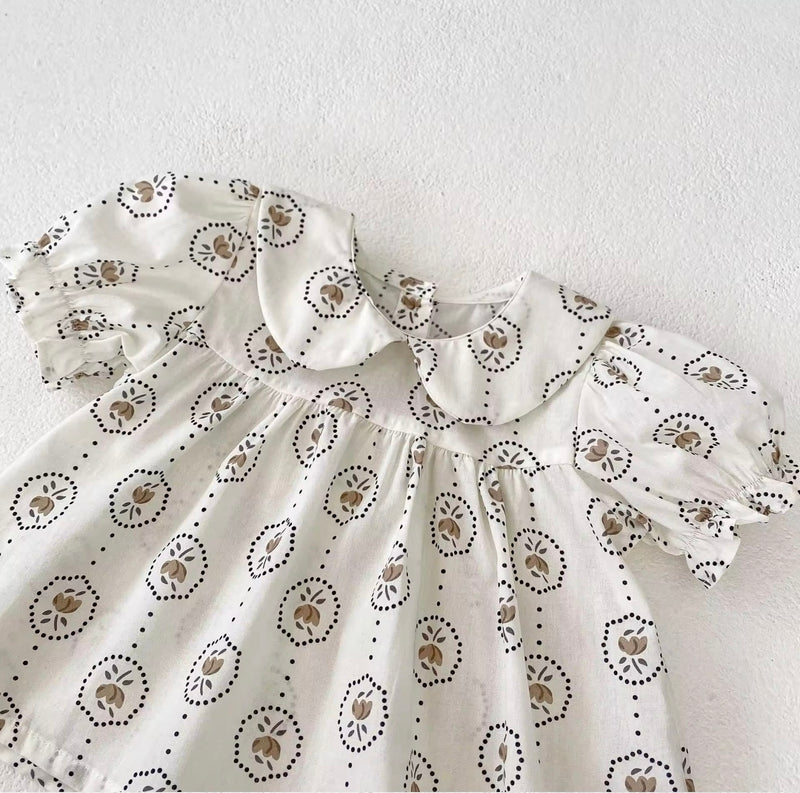 Load image into Gallery viewer, Summer baby romper with round floral patterns
