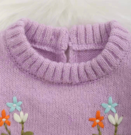 Soft lilac knitted baby jumpsuit with embroidery