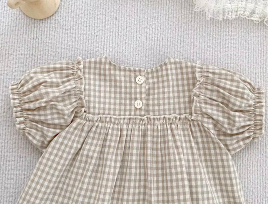 Barboteuse bébé fille à carreaux avec broderie florale – Camille