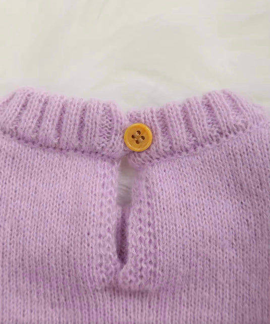 Soft lilac knitted baby jumpsuit with embroidery