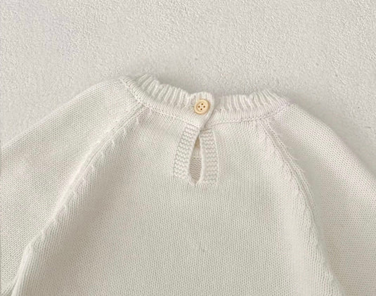 Soft knit baby jumpsuit with floral pattern – Kali