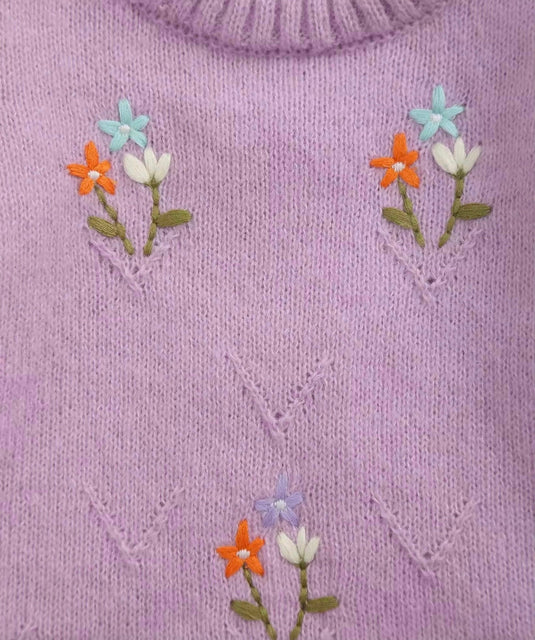 Soft lilac knitted baby jumpsuit with embroidery